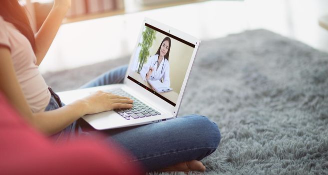 Patient talk consult with doctor using video call on laptop, woman speak discuss health problem with physician on video call  from home, Online consultation concept