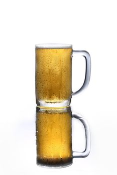 Beer mug with reflection, isolated on white