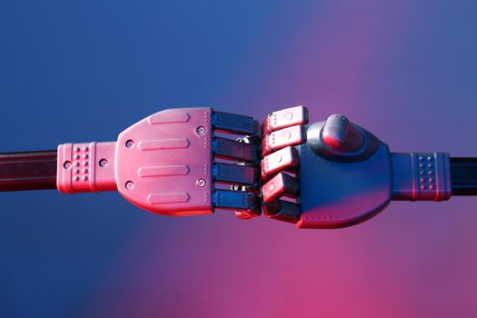 Robot hands are connected. Futuristic technology concept