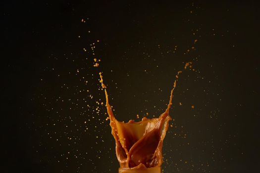 Coffee splash on dark background