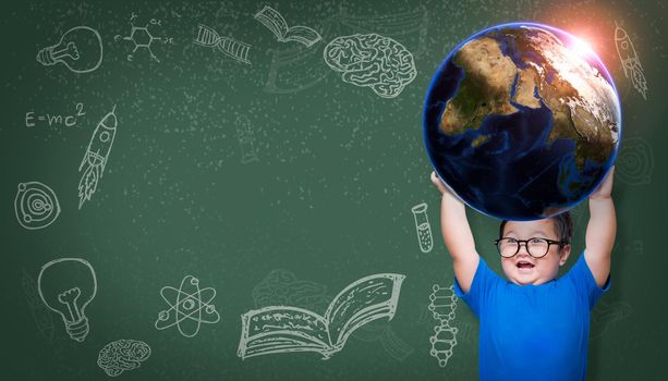 Asian boy student raising green globe on school chalkboard for world education concept. Elements of this image furnished by NASA