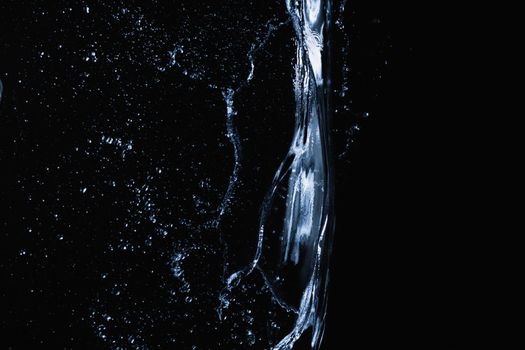 Water splash on dark background