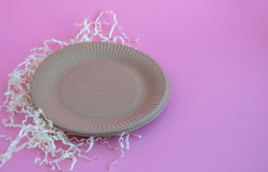 Eco-friendly background on pink background. The concept of a sustainable, environmentally friendly lifestyle.