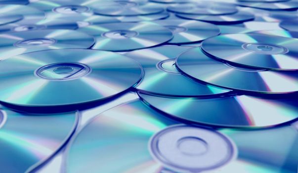 Stack of CD and DVD background.