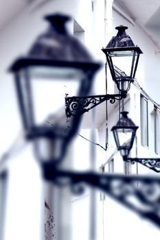 City and old streetlight detail.Town and urban architecture