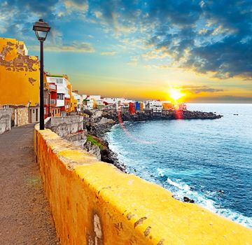 Sunset scenery Spain sea and island .Beach adventures and travel concept.Puerto de la cruz