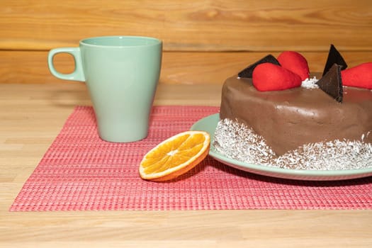 chocolate cake on the table on a light background. High quality photo