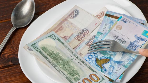Money tenge, Russian rubles and dollars are on the plate. Sawing the budget, the living wage, or the dual currency basket. The crisis in the countries of the fall in exchange rates.