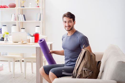 Young man getting ready for gym sports