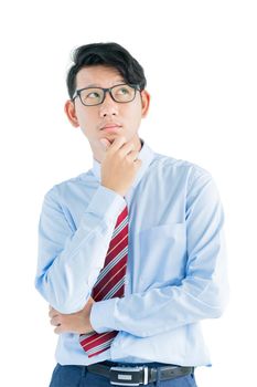 Male wearing blue shirt and red tie reaching posing in studio isolated on white background with clipping path