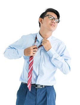 Male wearing blue shirt and red tie reaching hand out isolated on white background