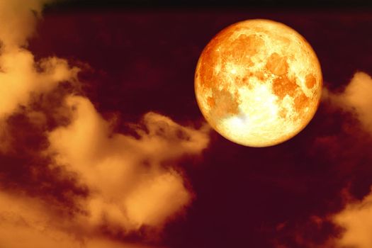 full corn blood moon and white gray silhouette cloud sky in the night sky, Elements of this image furnished by NASA