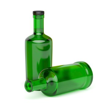 Two green glass bottles on white background