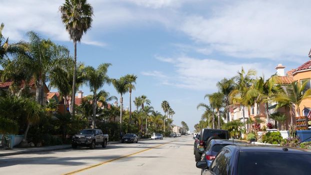 Oceanside, California USA - 27 Jan 2020: Typical suburban street. Different houses in row. Generic american homes, buildings facade, townhouse exterior architecture. Residential district real estate.