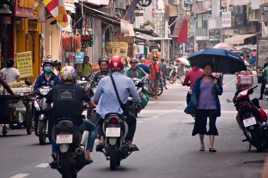 2019-11-12 / Ho Chi Minh City, Vietnam - Urban scene in a city street.