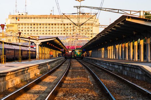 Detail of train in motion at train platform at Bucharest North Railway Station (Gara de Nord Bucharest) in Bucharest, Romania, 2020