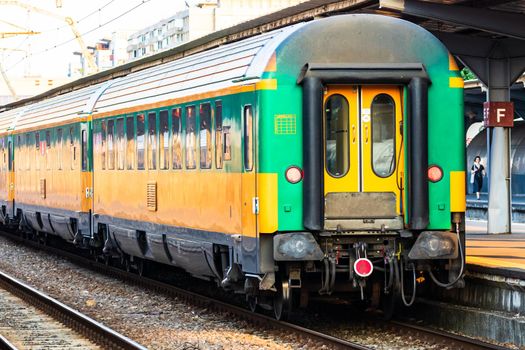 Detail of train in motion at train platform at Bucharest North Railway Station (Gara de Nord Bucharest) in Bucharest, Romania, 2020