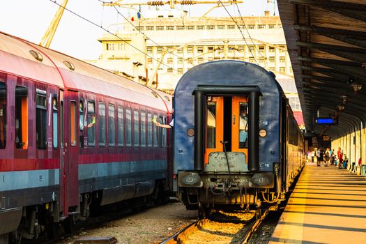 Detail of train in motion at train platform at Bucharest North Railway Station (Gara de Nord Bucharest) in Bucharest, Romania, 2020