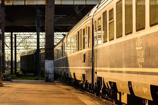 Detail of train in motion at train platform at Bucharest North Railway Station (Gara de Nord Bucharest) in Bucharest, Romania, 2020