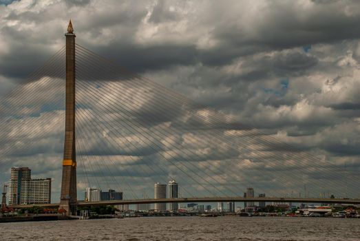 Bangkok, thailand 21 Jul, 2019 : Rama Rama VIII bridge, Rope Bridge across the Chao Phraya River of view blue sky is background and Cityscape of Bangkok.