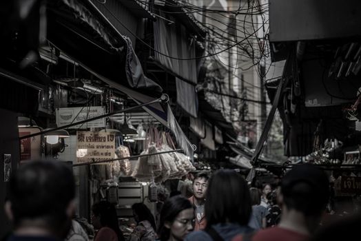 Bangkok, Thailand - 27 Oct 2019 : Local people walk around are shopping at Old market in Yaowarat, Chinatown in Bangkok is one of the most famous landmark in Bangkok, Selective focus.