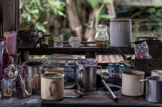 Samut Sakhon, Thailand - Nov 02, 2019 : local cafe -decorated with vintage wooden furniture and antique goods, Making a traditional Thai Coffee and Tea on counter for sale at street food market, vintage style, Selective focus.