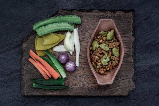 Thai food,  Southern Thai dry curry with ground pork Khua Kling, Thai dry curry with ground pork with Herbs vegetables, view from above.