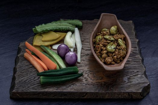 Thai food,  Southern Thai dry curry with ground pork Khua Kling, Thai dry curry with ground pork with Herbs vegetables, Oblique view from the top.