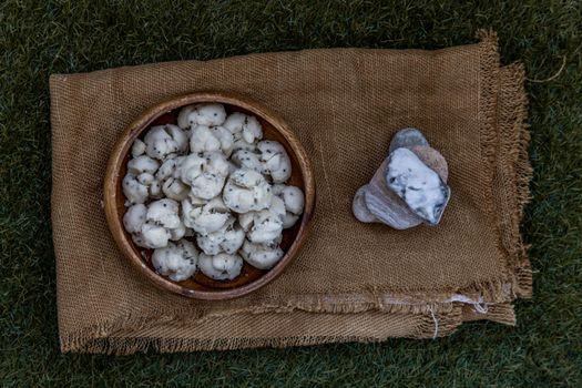 Thai Shortbread Cookies (Thai Dessert), Kanom Kleeb Lum Duen on burlap fabric background, view from above, Selective focus.
