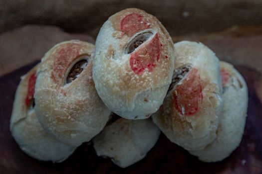 Close-up of Chinese Pastry (Happiness pastry) on wooden. This type of traditional chinese pastry is typically shared with friends and relatives during happy occasions, especially wedding ceremonies.