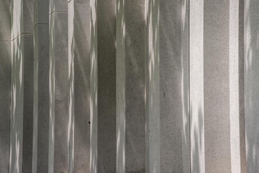 Sunlight passing through the exterior of the concrete building. copy space.
