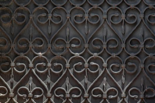 ornate wrought-iron elements of metal gate decoration. copy space.