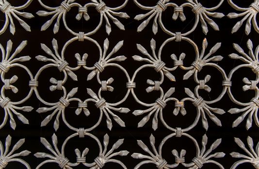 ornate wrought-iron elements of metal gate decoration. copy space.
