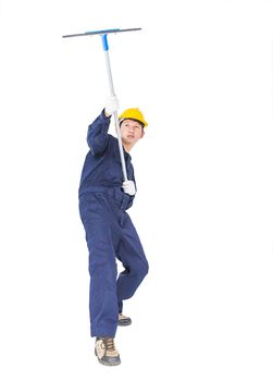 Young man in uniform hold mop for cleaning glass window, Cut out isolated on white background with clipping path