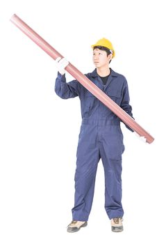 Young plumber in uniform holding pvc pipe isolated on white background  with clipping path