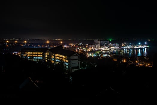 Chonburi, thailand - Oct 05, 2019 : Laem Thaen with top view on Khao Sam Muk Mountain at night view of chonburi, Beautiful Khao Sam Muk view point twilight.