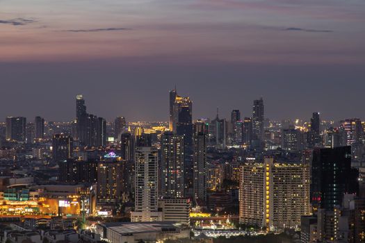 Bangkok, thailand - Mar 06, 2020 : Sky view of Bangkok with skyscrapers in the business district in Bangkok in the evening beautiful twilight give the city a modern style. Selective focus.