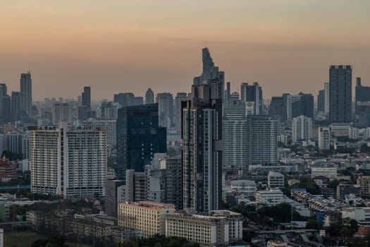 Bangkok, thailand - Mar 06, 2020 : Sky view of Bangkok with skyscrapers in the business district in Bangkok in the evening beautiful twilight give the city a modern style. Selective focus.