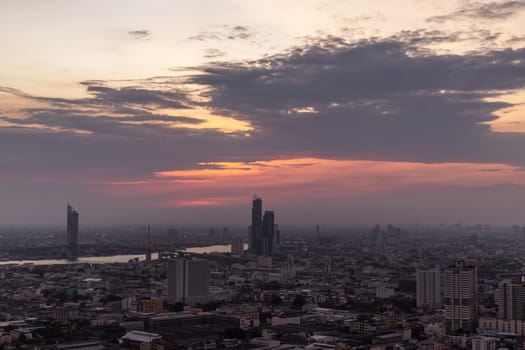 Bangkok, thailand - Mar 06, 2020 : Beautiful view of Bangkok city, Beauty skyscrapers along Chaopraya river in the evening, making the city modern style. Selective focus.
