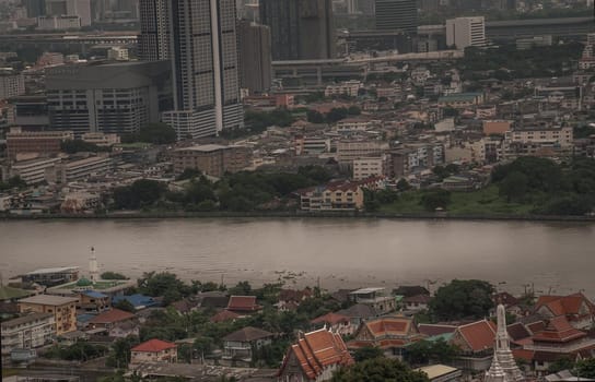 Bangkok, Thailand - Oct 05, 2019 : Beautiful view of Bangkok city, Beauty skyscrapers along Chaopraya river in the afternoon, making the city modern style, Selective focus.