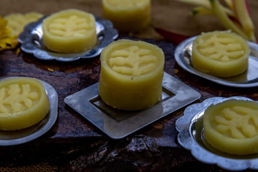 A dish of Delicious Thai Traditional Dessert called Thua Kwan (Mung Bean Cookies), Oblique view from the top.