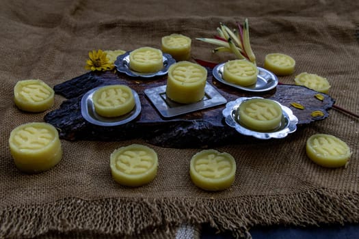 A dish of Delicious Thai Traditional Dessert called Thua Kwan (Mung Bean Cookies), Oblique view from the top.