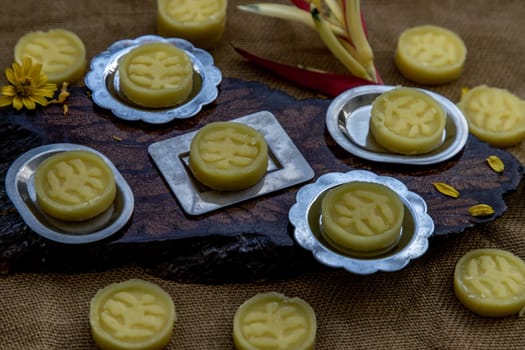 A dish of Delicious Thai Traditional Dessert called Thua Kwan (Mung Bean Cookies), Oblique view from the top.