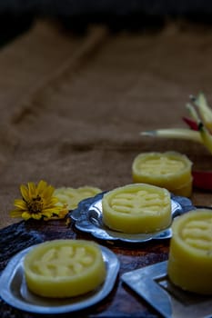 A dish of Delicious Thai Traditional Dessert called Thua Kwan (Mung Bean Cookies), Oblique view from the top, copy space.