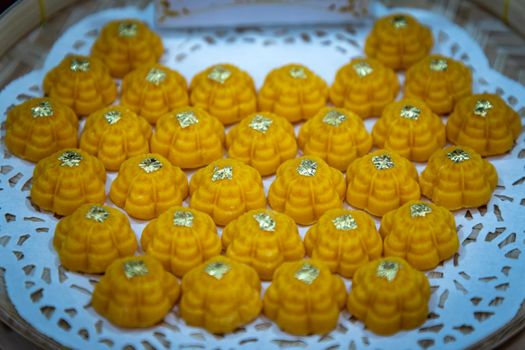 Thai dessert, Royal Thai cuisine : Khanom Dara Thong or Thong Eak krajang, Most famous of nine auspicious desserts in Thai tradition, made from yolk, wheat flour and edible gold.