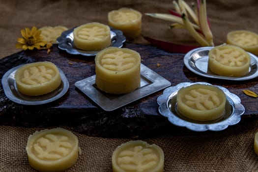A dish of Delicious Thai Traditional Dessert called Thua Kwan (Mung Bean Cookies), Oblique view from the top.