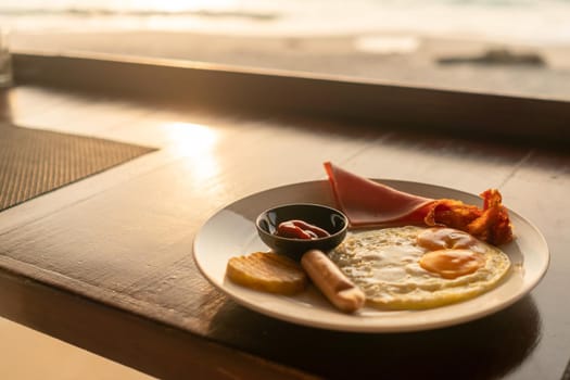 American breakfast set on old wood vintage table background.