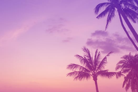 Tropical nature clean beach and white sand in summer season with sun light colorful pink purple background.