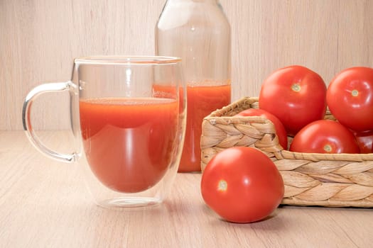 tomato juice and red tomatoes close up. High quality photo