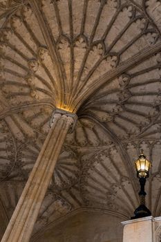 Low-angle view of a gothic column and vault at Christ Church College in Oxford